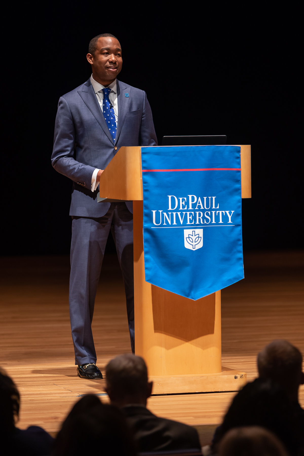 Steve Stoute, chief of staff, begins the program by introducing a video about the new strategic plan. (DePaul University/Jeff Carrion)